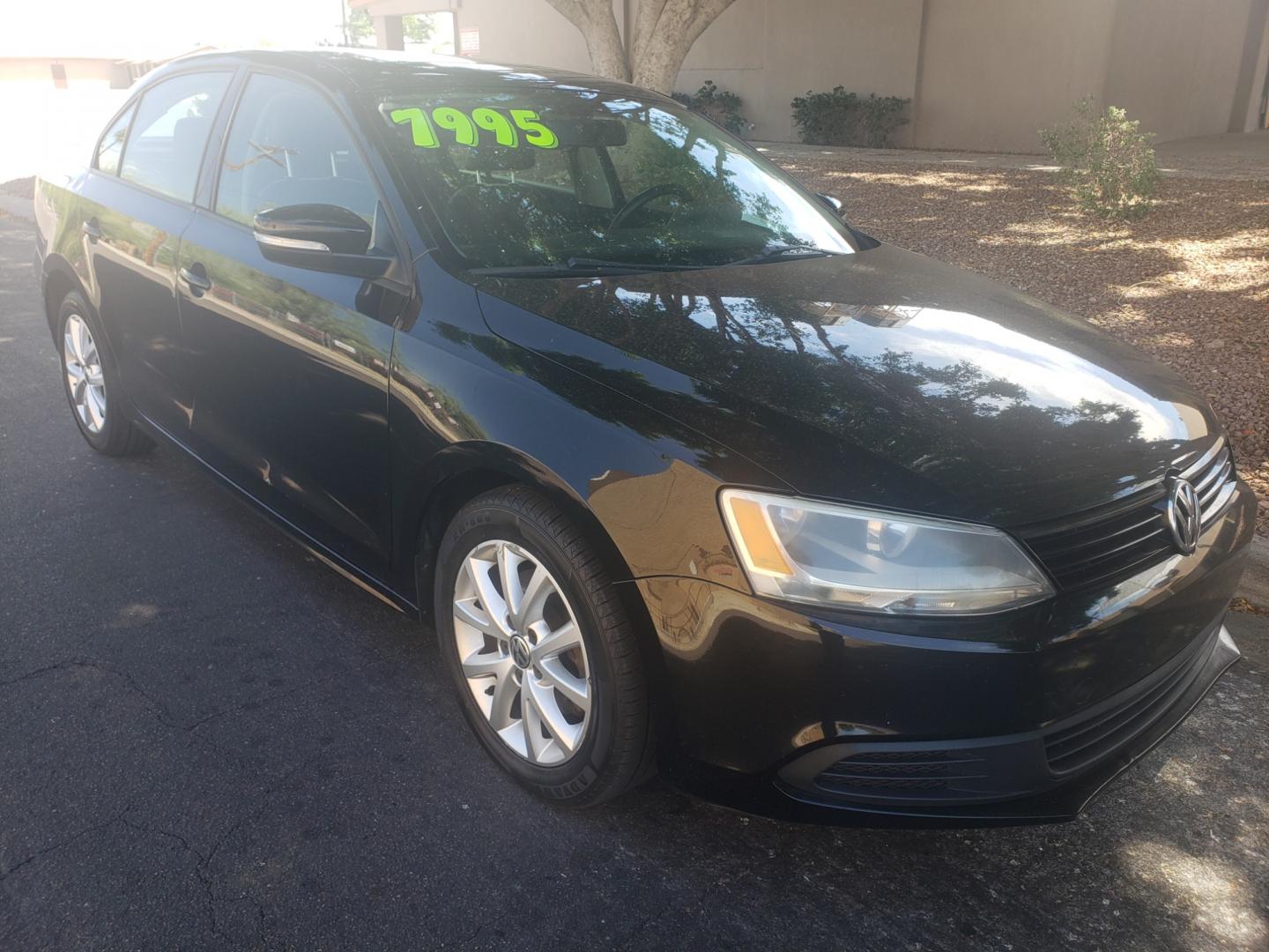 2012 /black Volkswagen Jetta SE (3VWDX7AJ6CM) with an 2.5 l5 engine, 6-Speed Automatic transmission, located at 323 E Dunlap Ave., Phoenix, AZ, 85020, (602) 331-9000, 33.567677, -112.069000 - 2012 Volkswagen Jetta,...... A True Must See!!....... No accidents, Cold AC, The car is gorgeous inside and out, Touch screen stereo/CD player, Bluetooth, satellite compatible, phone sync, power windows, power door locks, Clean Black interior Black with beautiful Black leather seats in near perfect - Photo#2